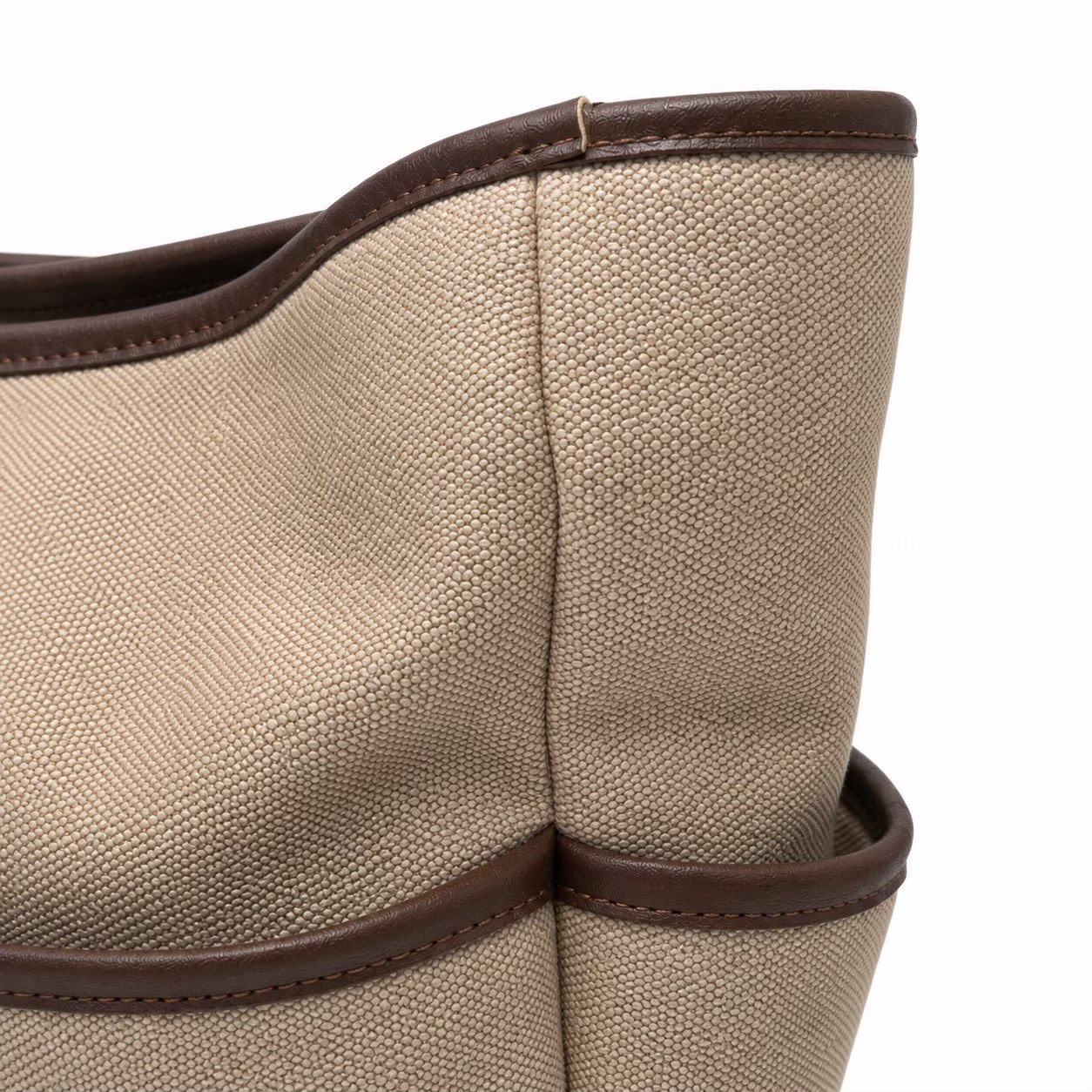 CAO Tote in Brown / Ecru, side view with the end slip pocket