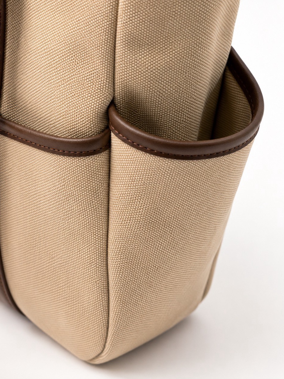 The open end pockets, edged in leather